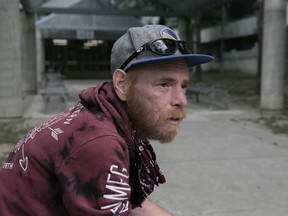 Rob Dods, a former homeless resident who lived in a now-vacant building, is shown in Toronto on Saturday, Sept.5, 2020. Toronto is considering an ambitious new plan to combat homelessness as the COVID-19 pandemic continues to exacerbate the issue.THE CANADIAN PRESS/Jake Kivanc