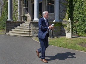 New Brunswick Premier Blaine Higgs heads from a visit with Lt.-Gov Brenda Murphy at Government House in Fredericton on Monday, Aug. 17, 2020. New Brunswick's party leaders are back on the election campaign trail today following last night's first debate.