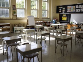 Socially distanced desks inside a classroom at Blessed Sacrament Catholic School as it prepares to reopen in Toronto, Ontario, Canada, on Friday, Sept. 4, 2020.