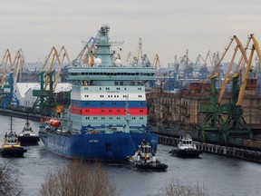 The nuclear-powered icebreaker Arktika is seen drawn by tug boats as it starts the sea trials, in Saint Petersburg, Russia December 12, 2019.