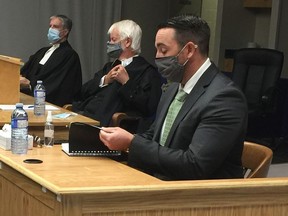 Police officer Carl Douglas Snelgrove (right) takes the stand at his sexual assault trial in St.John's, Tuesday, Sept.22, 2020.
