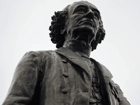 Scottish economist Adam Smith believed we are hardwired to venerate powerful people ­— like Sir John A. MacDonald, above — and we should fight that impulse.