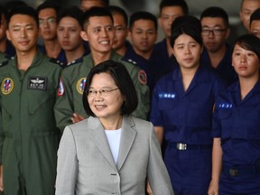Taiwan's President Tsai Ing-wen meets with members of the military during her visit to Penghu Air Force Base on Magong island in the Penghu islands on Sept. 22, 2020.