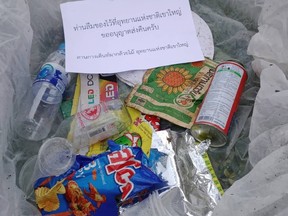 On his Facebook page, Varawut Silpa-archa posted a photo of a box of trash left at a national park with a note that said, "You forgot something at Khao Yai National Park."