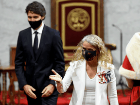 Governor General Julie Payette leaves with Prime Minister Justin Trudeau after the throne speech in the Senate chamber in Ottawa, September 23, 2020.