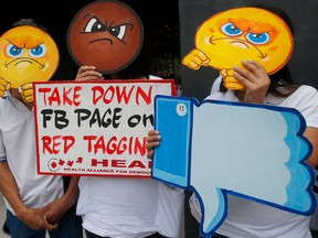 People picket Facebook's offices in suburban Taguig city, in the Philippines, in 2019.