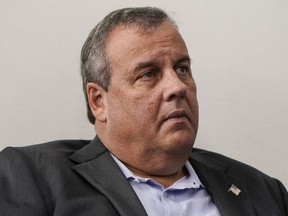 Former New Jersey Governor Chris Christie listens as  U.S. President Donald Trump speaks during a news conference in the Briefing Room of the White House on September 27, 2020 in Washington, DC.