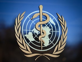 The World Health Organization logo is seen at its headquarters in Geneva.