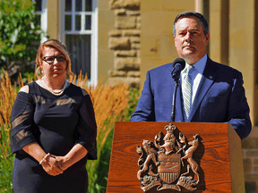 Alberta Minister of Municipal Affairs Tracy Allard with Premier Jason Kenney at a cabinet shuffle announcement in August 2020.