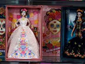 View of two Catrina Barbie dolls at the Museum of the Old Mexican Toy in Mexico City on October 20, 2020. PHOTO BY ALFREDO ESTRELLA/AFP.