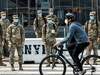 National Guard exit the Jacob K. Javits Convention Center in Manhattan, which was converted into a field hospital during the early days of the COVID-19 outbreak in New York, April 5, 2020.