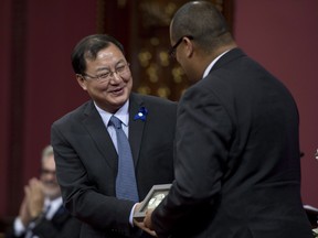 Scientist Ke Wu receives the Marie-Victorin award during a Prix du Quebec award ceremony Tuesday, November 4, 2014 at the National Assembly in Quebec City.