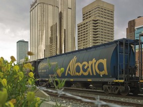 A freight train travels through Calgary in 2007.