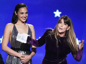 Actor Gal Gadot and director Patty Jenkins accept Best Action Movie for Wonder Woman onstage during The 23rd Annual Critics' Choice Awards at Barker Hangar on Jan. 11, 2018 in Santa Monica, Calif.
