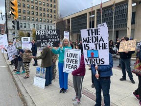 Anti-mask demonstrators gather in Winnipeg on Sept. 30.