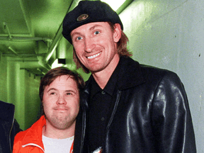 Oilers' dressing room attendant Joey Moss with friend Wayne Gretzky in 1997.