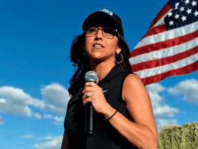 Republican candidate for the U.S. House of Representatives Lauren Boebert addresses supporters during a campaign rally in Colona, Colorado on October 10. She told a conservative podcast last spring that she hopes Q "is real."