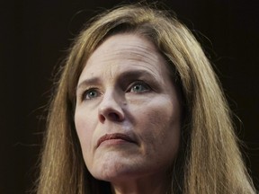 Amy Coney Barrett, U.S. President Donald Trump's nominee for associate justice of the U.S. Supreme Court, listens during a Senate Judiciary Committee confirmation hearing in Washington, D.C., U.S., on Monday, Oct. 12, 2020.