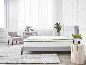 Photo of white Silk & Snow organic mattress in brightly-lit room.