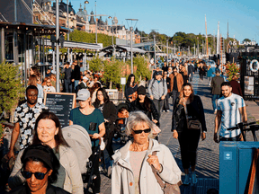 People walk in Stockholm, Sweden, on September 19, 2020.