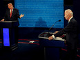 U.S. President Donald Trump gestures toward Democratic presidential candidate former Vice President Joe Biden during the second and final presidential debate in Nashville, Tennessee, October 22, 2020.
