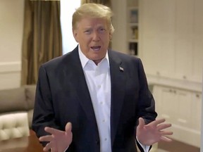 U.S. President Donald Trump makes an announcement from the Walter Reed National Military Medical Center,  in Bethesda, Maryland, U.S. October 4, 2020, in this still image taken from a video posted on Trump's twitter page.