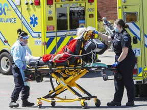 A patient is brought to the emergency department at the Verdun Hospital, Thursday May 14, 2020 in Montreal.