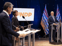 NDP Leader John Horgan, right, prepares to debate Green leader Sonia Furstenau and Liberal leader Andrew Wilkinson in Vancouver on Tuesday, October 13, 2020.
