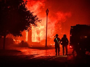 A home bursts into flames from the Shady Fire as it approaches Santa Rosa,  California on September 28, 2020.
