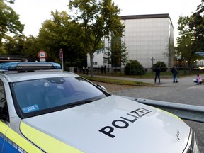 A police vehicle is seen at the area where a Jewish man was attacked, in front of the Hamburg synagogue, Hamburg, Germany October 4, 2020.