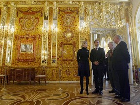Norwegian Crown Prince Haakon and Crown Princess Mette-Marit visit the Amber Room in the Ekaterininski Palace in Pushkin village on October 28, 2003 near St. Peterburg, Russia.