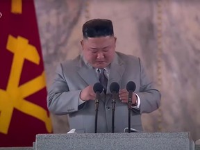 This screen grab taken from a KCTV broadcast on October 10, 2020 shows North Korean leader Kim Jong Un pausing as he makes a speech prior to a military parade marking the 75th anniversary of the founding of the Workers' Party of Korea, on Kim Il Sung square in Pyongyang.