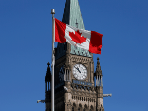 A Canadian flag on Parliament Hill.