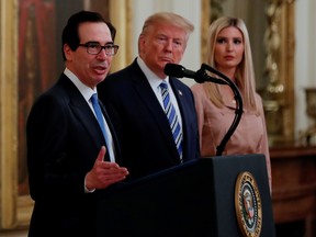 Treasury Secretary Steven Mnuchin speaks as U.S. President Donald Trump and White House senior adviser Ivanka Trump listen during an East Room event highlighting Paycheck Protection Program (PPP) loans for small businesses adversely affected by the coronavirus disease (COVID-19) outbreak, at the White House in Washington, U.S., April 28, 2020.