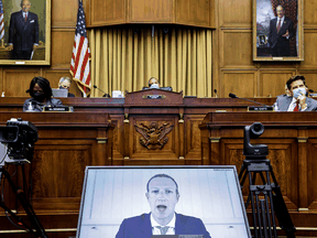 Facebook CEO Mark Zuckerberg speaks via video conference at a July hearing of the House Judiciary Subcommittee on Antitrust. The subcommittee’s report calls for tech companies like Facebook to be broken up and reined in.