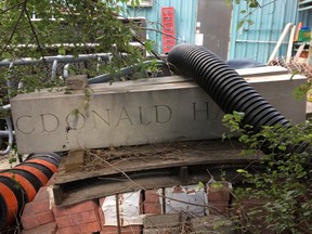 Remnants of the original entrance to Sir John A. Macdonald Hall sit in a scrap pile at Queen's University in Kingston, Ont.