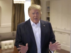 U.S. President Donald Trump makes an announcement from the Walter Reed National Military Medical Center, where he is being treated for the coronavirus disease (COVID-19), in Bethesda, Maryland, U.S. October 4, 2020.