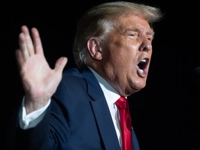 U.S. President Donald Trump holds a Make America Great Again rally as he campaigns at Orlando Sanford International Airport in Sanford, Florida, October 12, 2020.