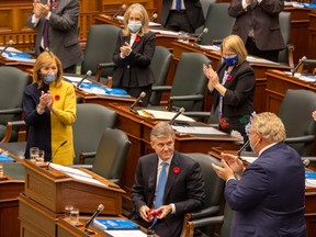 Ontario Finance Minister Rod Phillips is applauded after delivering the provincial budget in the Ontario legislature in Toronto on Nov. 5.