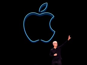 In this file photo taken on June 3, 2019 Apple CEO Tim Cook presents the keynote address during Apple's Worldwide Developer Conference (WWDC) in San Jose, California. PHOTO BY BRITTANY HOSEA-SMALL/AFP/Getty Images.