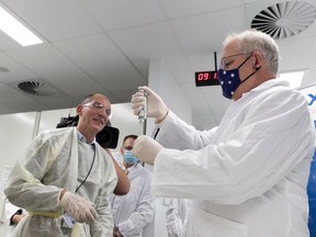 Prime Minister Scott Morrison takes a tour of the Scientia Clinical Research Ltd lab in Randwick on November 05, 2020 in Sydney, Australia.