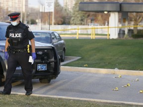 Police investigate a shooting in Toronto on Nov. 7.