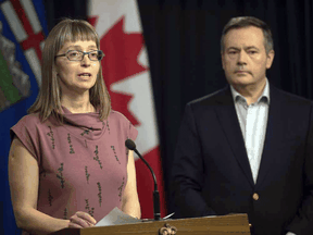 Dr. Deena Hinshaw, Alberta's chief medical officer of health, appears at a daily update on COVID-19 with Premier Jason Kenney on March 15, 2020.