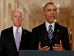 U.S. President Barack Obama, right, speaks with Vice-President Joe Biden at his side as he delivers a statement about the nuclear deal reached between Iran and six major world powers, in the White House in Washington, D.C., in 2015.