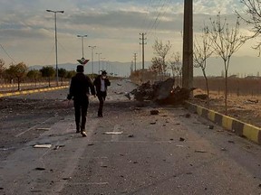 A handout photo made available by Iran state TV on November 27, 2020, shows the damage after an attack targeted the car of Iranian nuclear scientist Mohsen Fakhrizadeh near the capital Tehran.