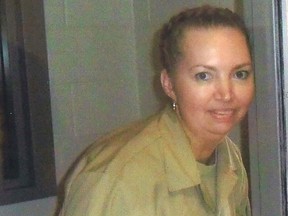 Lisa Montgomery, a federal prison inmate scheduled for execution on December 8, 2020, poses at the Federal Medical Center (FMC) Fort Worth in an undated photograph. Courtesy of Attorneys for Lisa Montgomery/Handout via REUTERS.
