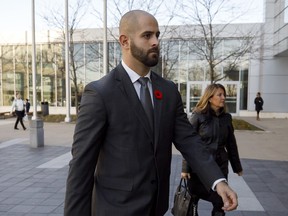 Michael Theriault arrives at the Durham Region Courthouse in Oshawa, Ont., ahead of Dafonte MIller's testimony, on Nov. 6, 2019.