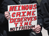 People protest in 2015 against further freedoms for Vince Li, who beheaded Tim McLean on an bus in 2008. Li was found not criminally responsible at his trial.