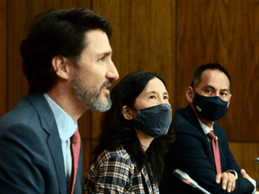 Prime Minister Justin Trudeau, Chief Public Health Officer Dr. Theresa Tam and Deputy Chief Public Health Officer Dr. Howard Njoo provide an update on the COVID-19 pandemic during a press conference on Friday, Nov. 13, 2020.