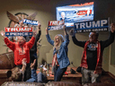 Trump supporters celebrate as they watch Ohio being called for Donald Trump at a Republican watch party at Huron Vally Guns in New Hudson, Michigan, November 3, 2020.